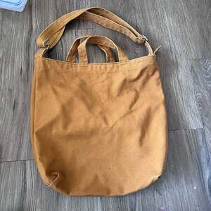 BAGGU Duck Bag Canvas Tote with Adjustable Strap in Brown/Copper